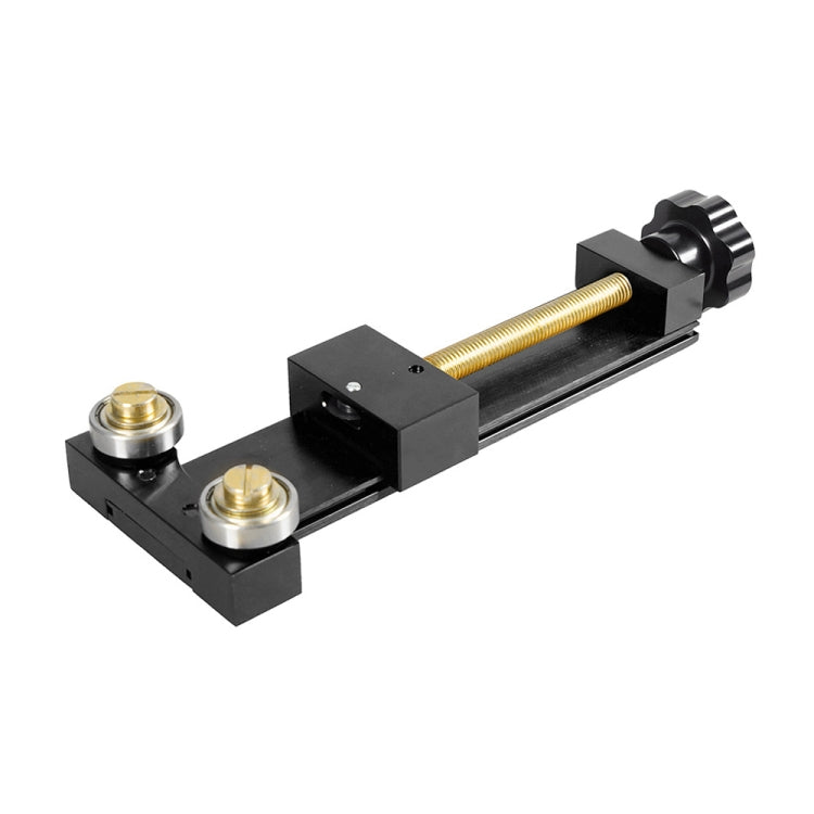 Black oil filter cutter tool with threaded screw and two mounting bolts