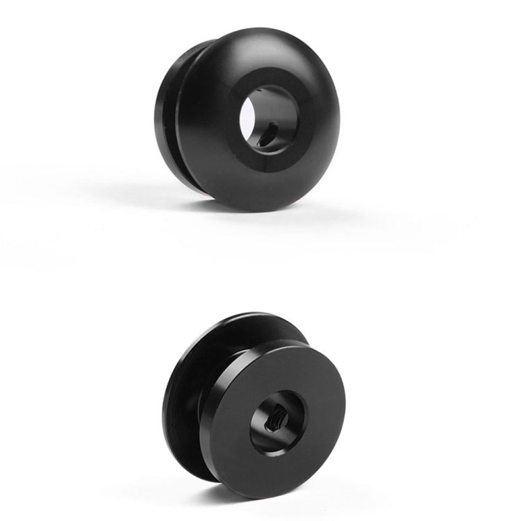 Black shift knob stopper, front and side views, with central mounting hole