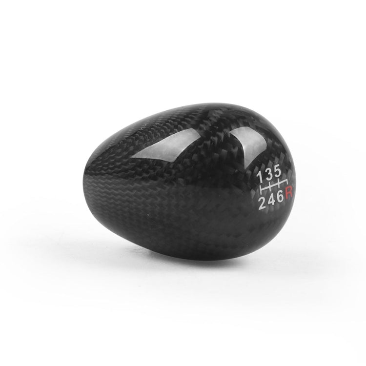Black carbon fiber gear shift knob head, showing 1-3-5 and 2-4-R shift pattern