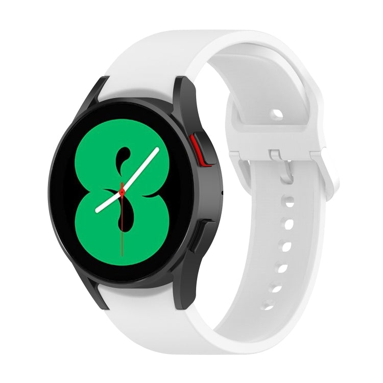 White silicone watch band with metal buckle and evenly spaced perforations