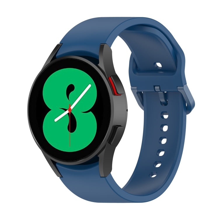 Dark blue silicone watch band with black clasp and perforated sizing holes, for smartwatch