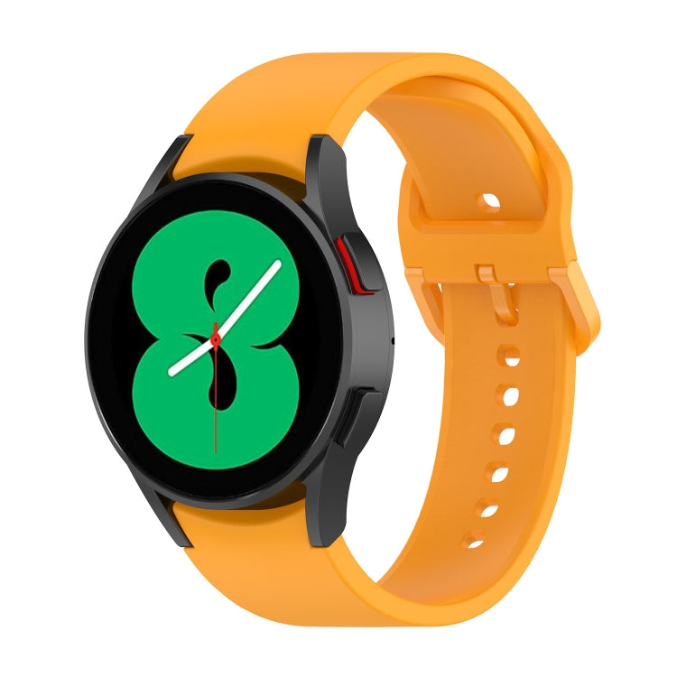 Orange silicone watch band with black clasp and perforated sizing holes, for smartwatch