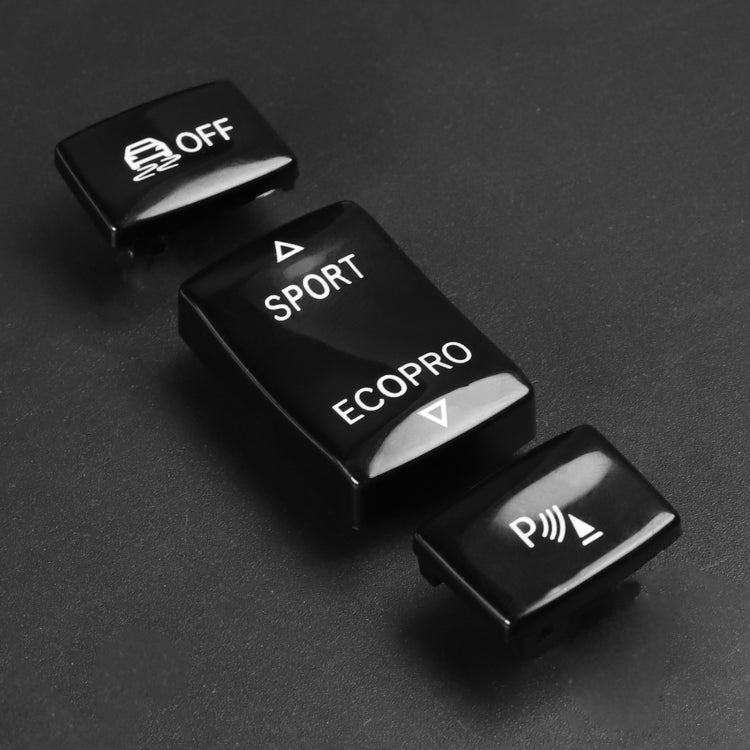 Black gear button set with SPORT, ECOPRO, OFF, and P icons, angled view