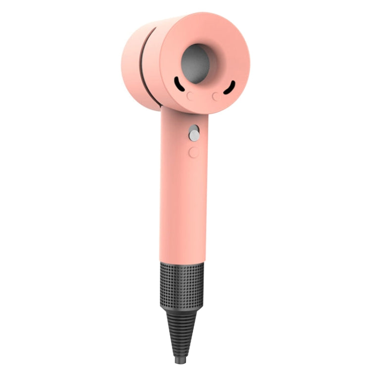 Coral pink silicone hairdryer protective case with round vent opening and side control buttons.