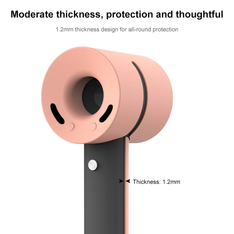 Coral pink silicone protective case showing head thickness and side profile.