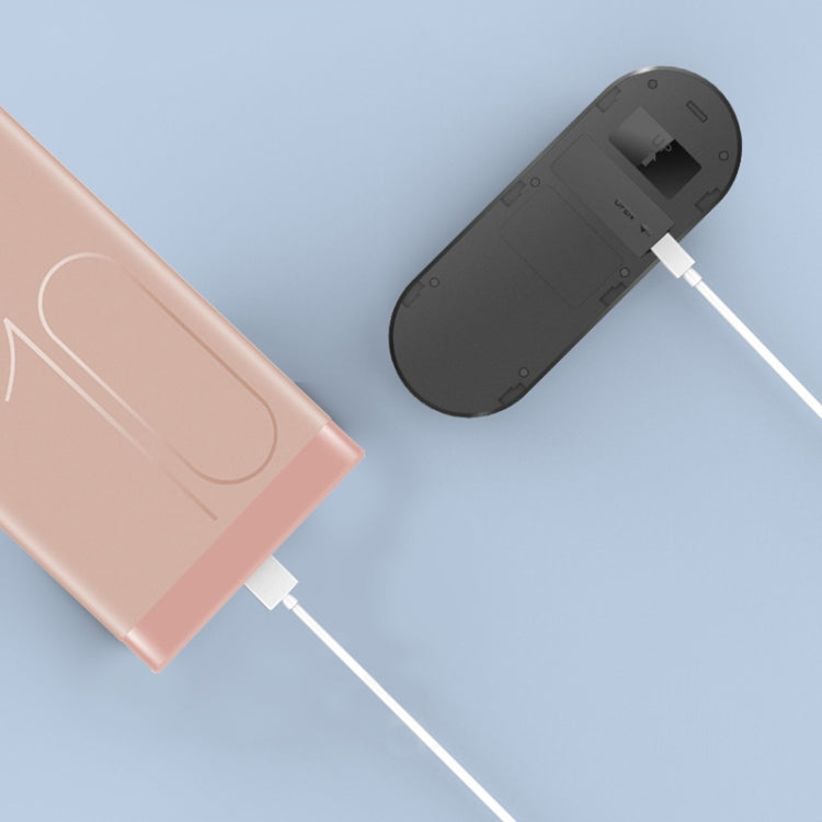 Smart doorbell rear panel with ports and connected charging cables