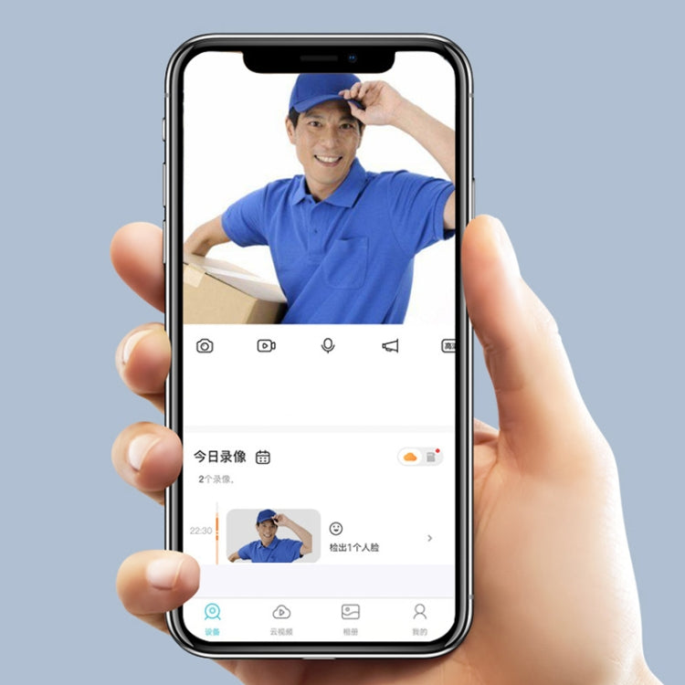 Smart doorbell app on smartphone showing a live video call screen