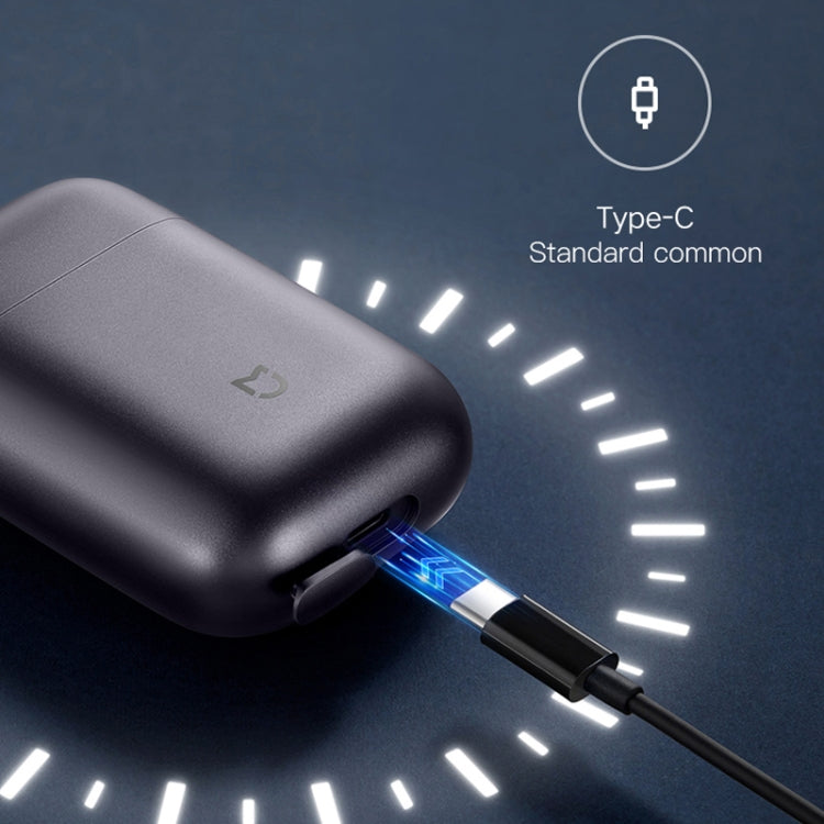 Electric shaver with Type-C charging port and connected dark cable