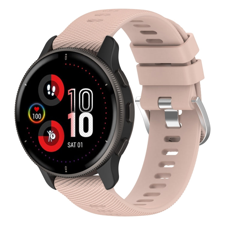 Light pink silicone watch band with cross-textured finish and clasp hardware