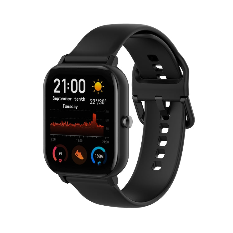 Black soft silicone watch band with perforated holes and buckle clasp