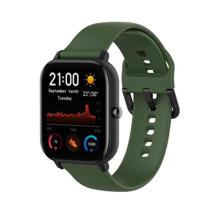 Green soft silicone watch band with perforated holes and buckle clasp