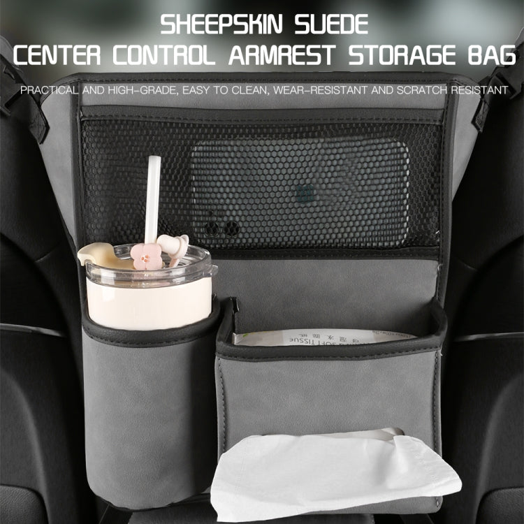 Grey car console hanging storage bag with mesh center pocket and two front pouches