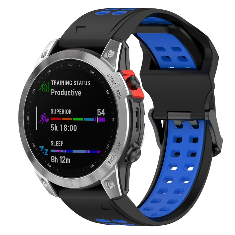 Two-tone silicone watch band with perforated strap and metal clasp; black and blue.