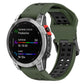 Two-tone silicone watch band with perforated strap and metal clasp; green and black.