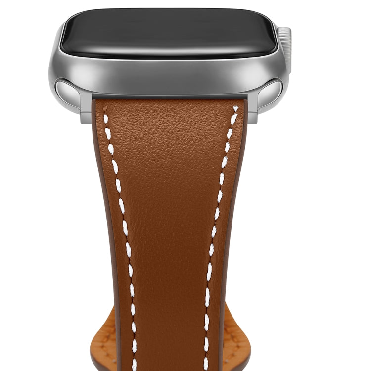 Brown leather Apple Watch band with silver pins and white contrast stitching