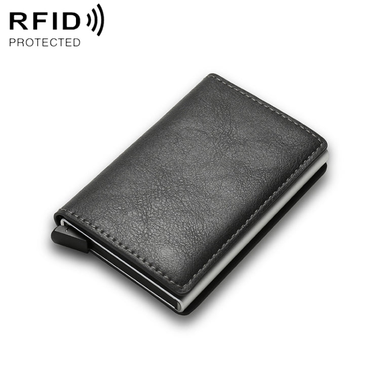 Dark gray leather-look RFID wallet with slim profile and metal money clip