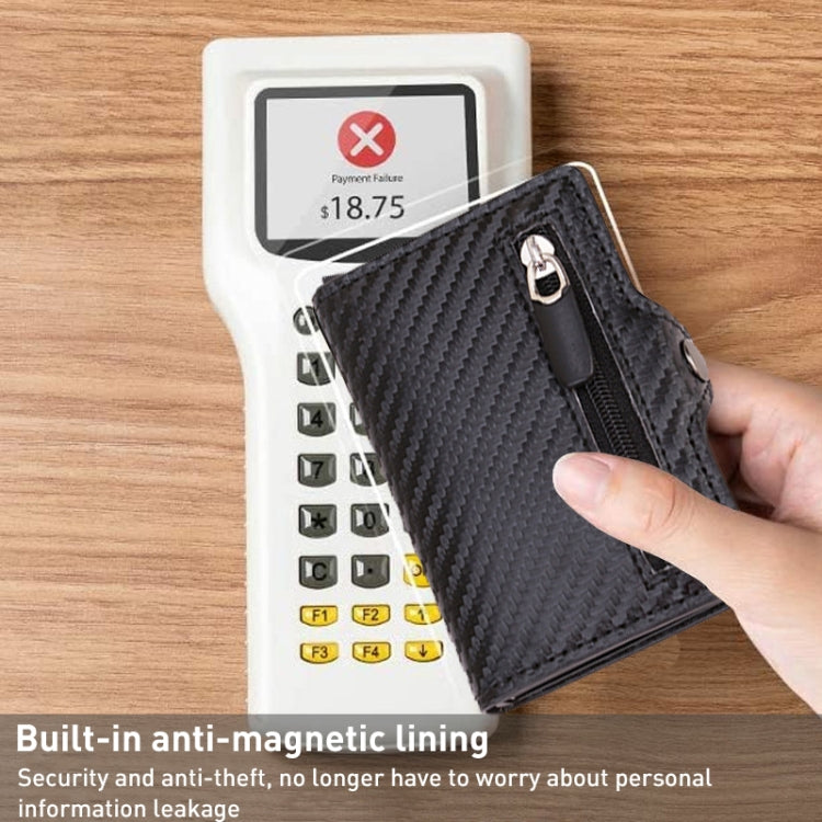 RFID carbon-fiber card holder with metal buckle, cards being inserted by hand