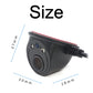 Black dome car side camera with red trim ring, front lens and cable plug