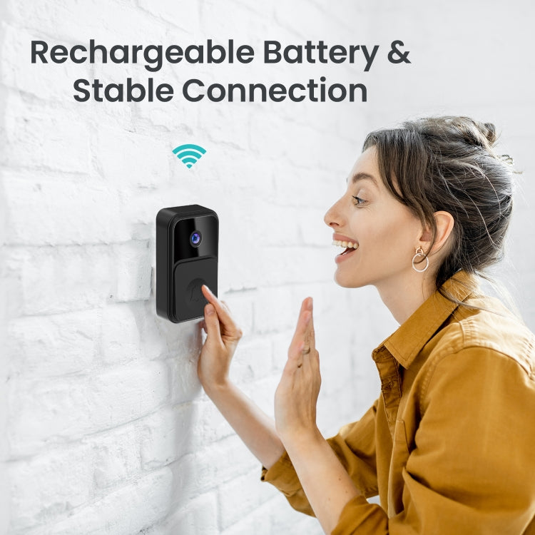 Black wireless smart video doorbell mounted on exterior wall