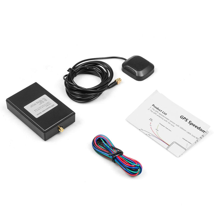 GPS speedometer sensor kit with black box, antenna puck, cable harness, and instruction leaflet.