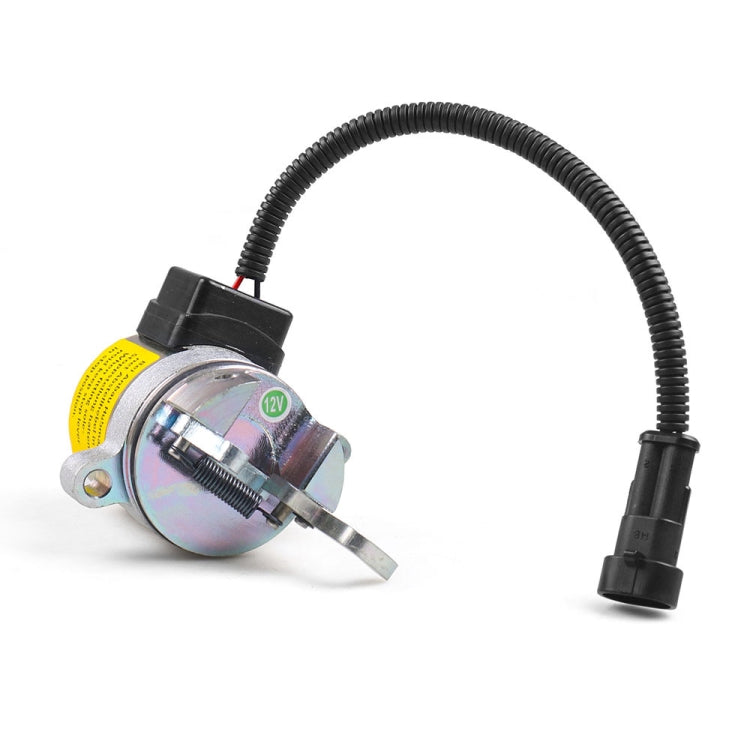 Fuel shutoff solenoid valve with yellow warning label and wiring lead