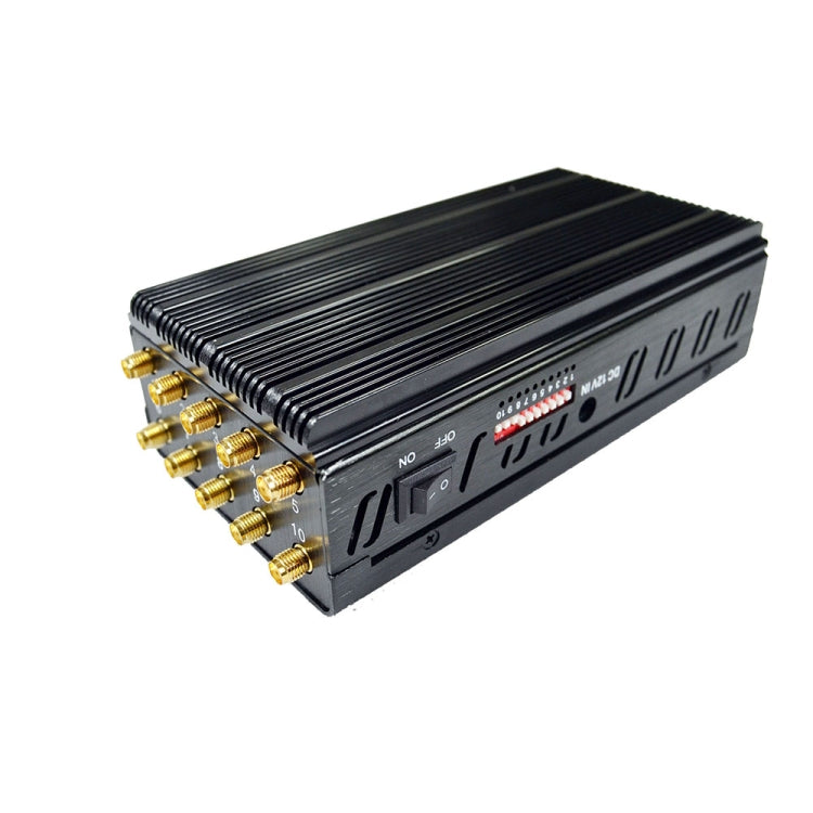 Signal jammer RF unit with gold coax connectors on black metal case, multiple output ports