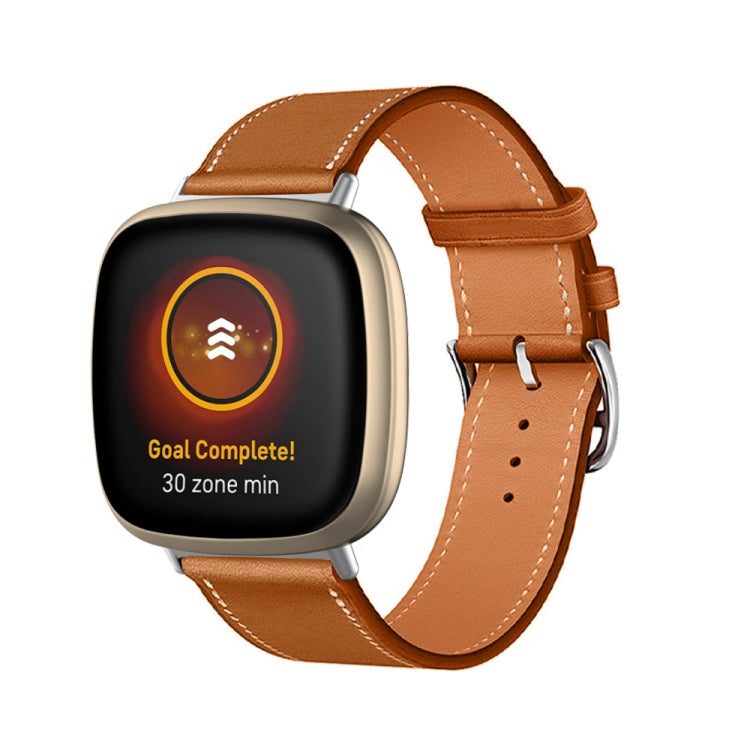 Brown leather watch band, metal pin and perforations for Fitbit Versa 4/Sense 2