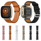 Assorted leather watch bands in brown and black with metal clasp and perforations
