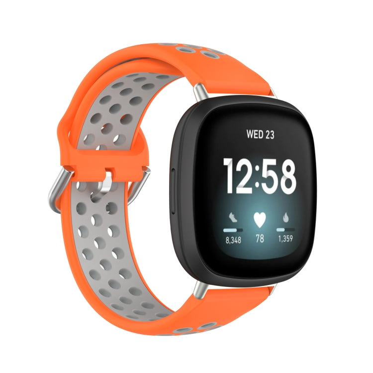 Dual-color silicone watch band with orange and gray perforated straps, for smartwatch