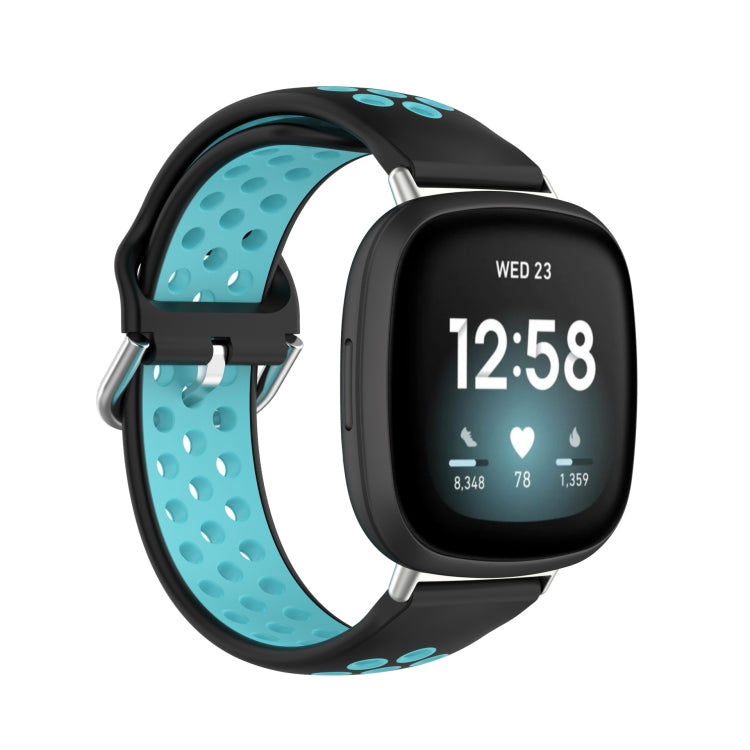 Dual-color silicone watch band with teal perforated strap and black case for smartwatch