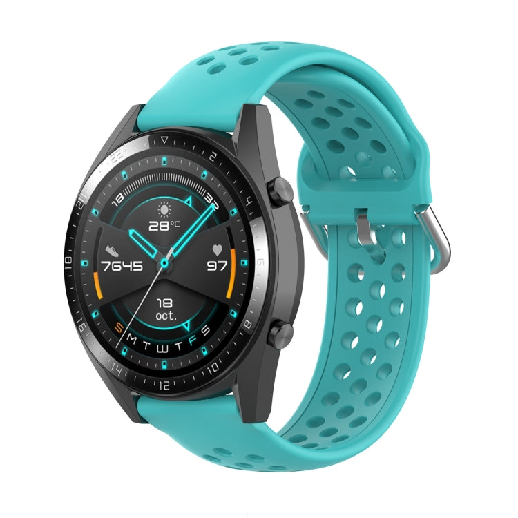Mint green silicone sport watch strap with perforated holes and metal clasp for secure fit