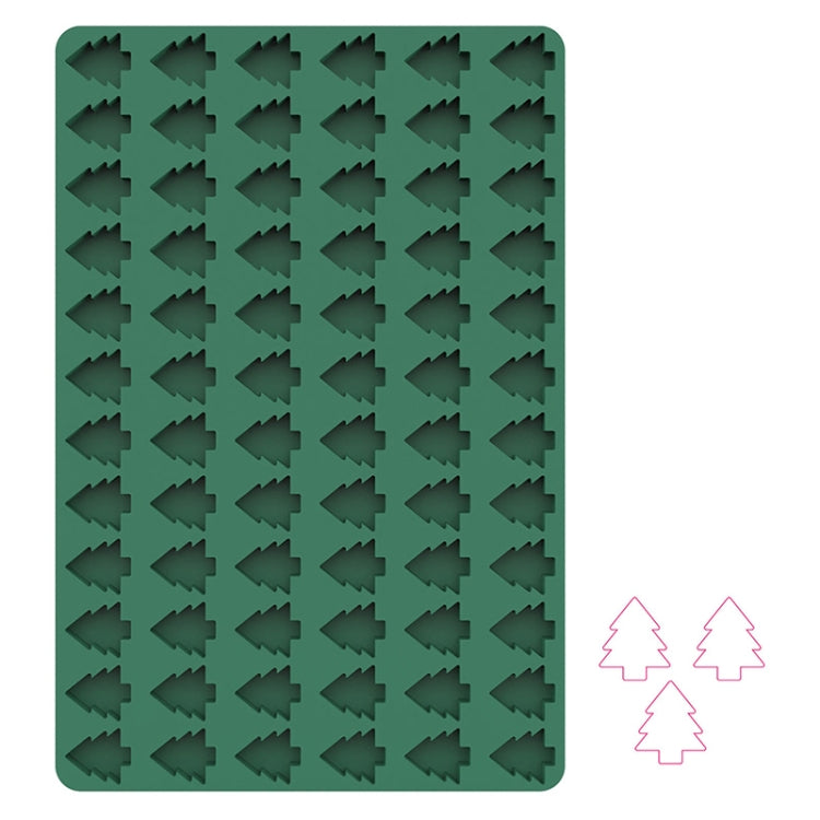 Green silicone baking mould with tree-shaped cavities