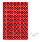 Red silicone cookie mould with bone-shaped cavities