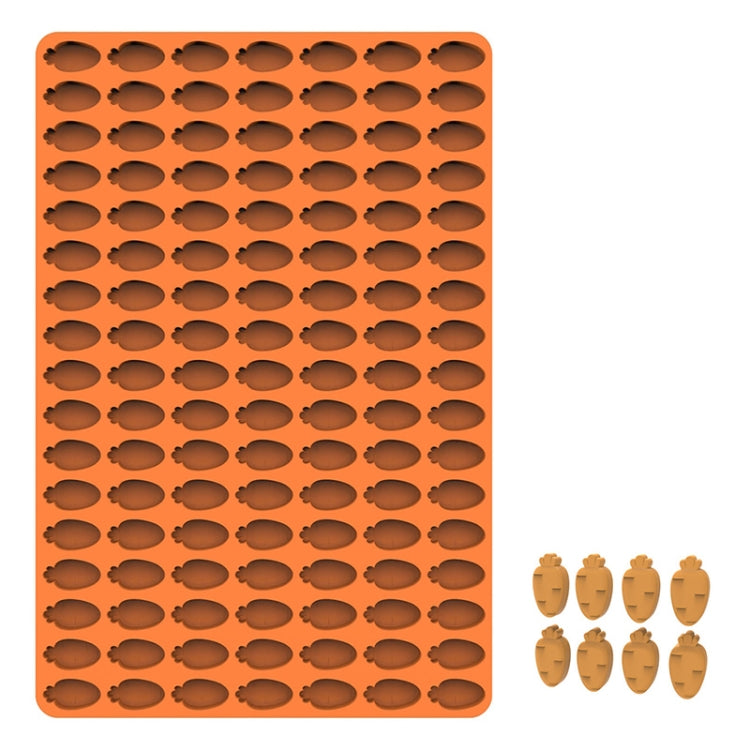 Orange silicone cookie mould with animal-shaped cavities