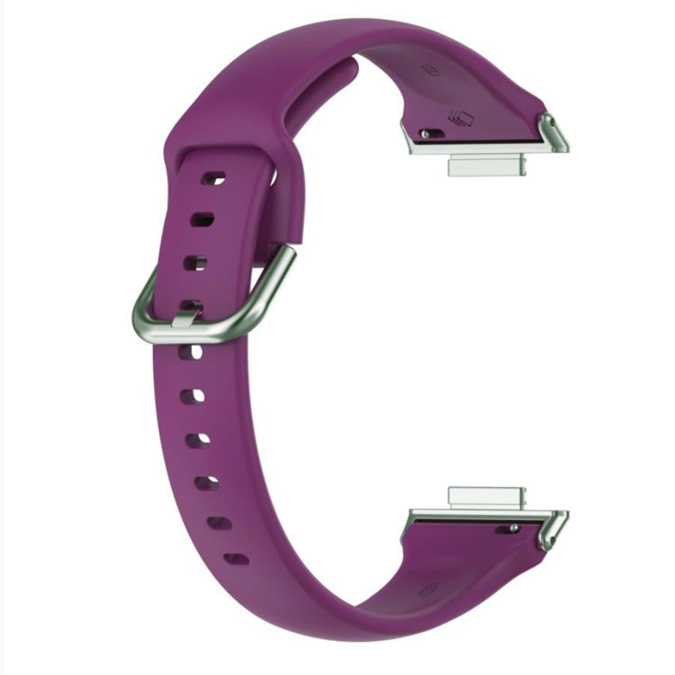 Purple silicone watch band with metal connectors and side holes for quick fit.