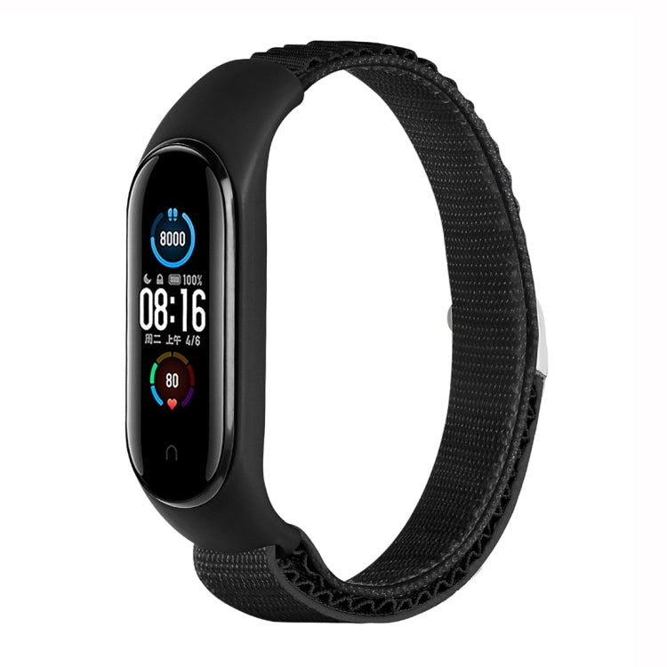 Black nylon loop watch band with fitness tracker attached, adjustable strap.