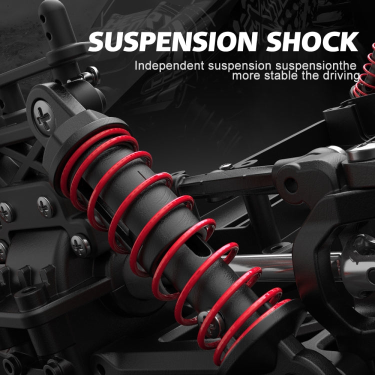 RC off-road suspension shock with red coil springs on black chassis parts