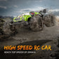 Light green 1:20 RC off-road vehicle jumping through dust with rugged tires