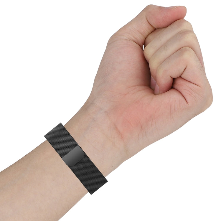 22mm milan-style watch strap on wrist, black mesh band