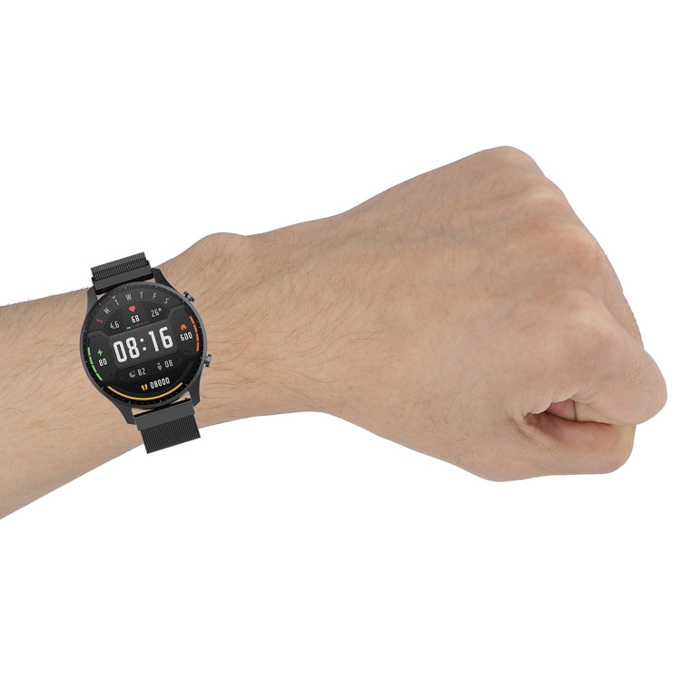 22mm milan-style watch strap on wrist, black mesh band with watch face