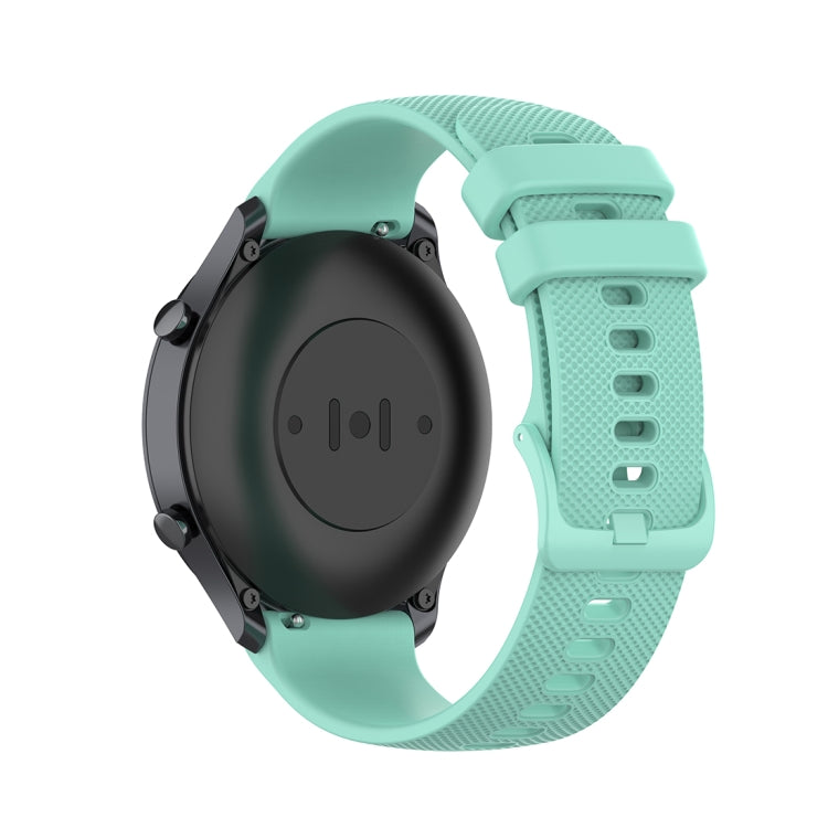 Teal 22mm silicone watch strap close-up of clasp and textured underside.