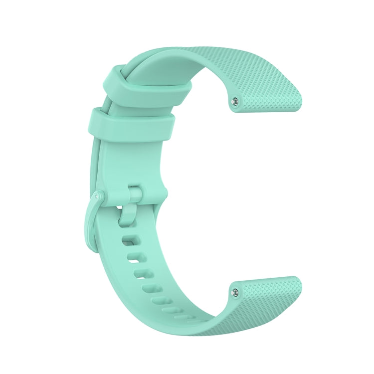 Teal 22mm silicone wristband with textured plaid exterior and multiple adjustment holes.