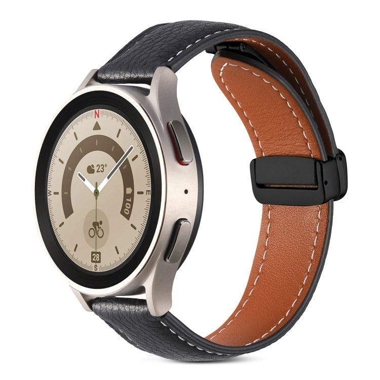 Black genuine leather watch band with folding buckle and tan stitched edge