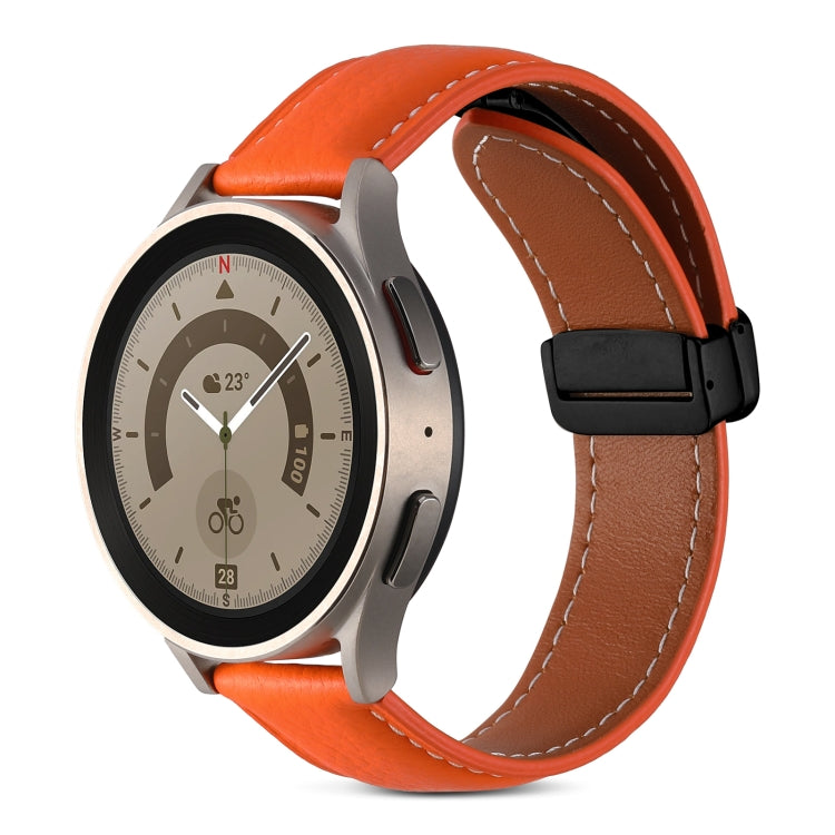 Orange genuine leather watch band with folding buckle and tan stitched edge