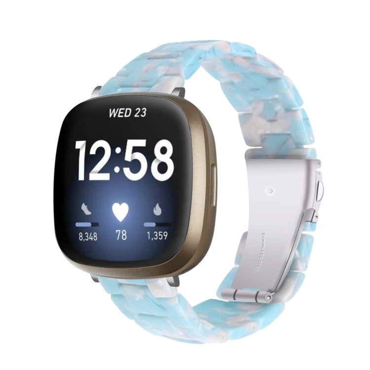 Blue translucent resin link watch band with molded pattern, smartwatch mounted