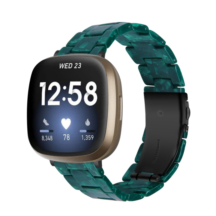 Teal green resin watch band with black smartwatch display showing 12:58