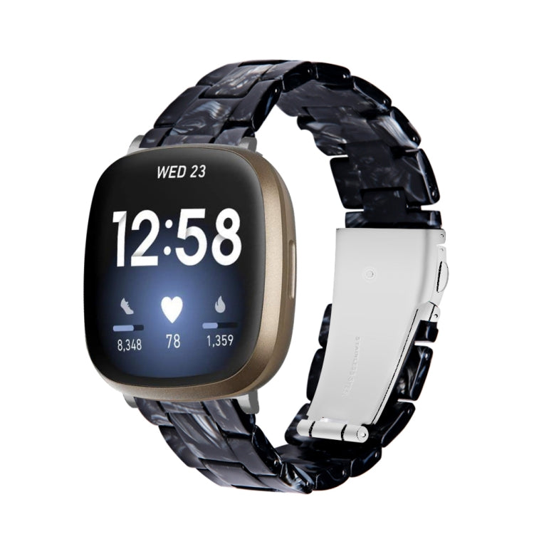 Universal resin watch band with black patterned links and white connector band, smartwatch shown