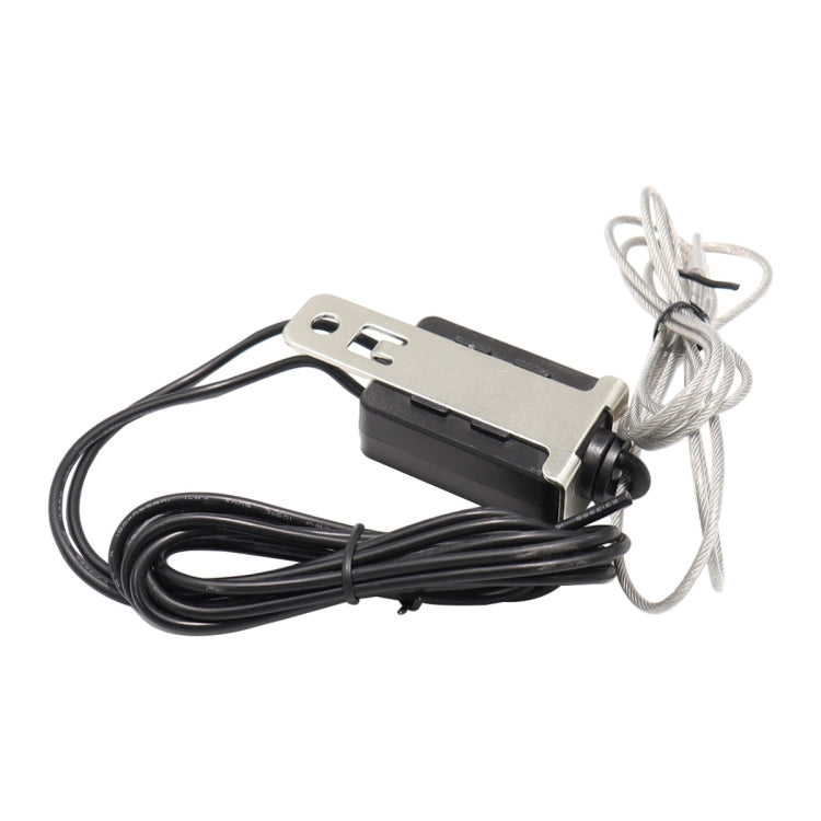 Breakaway switch control module on metal bracket with black and braided wires