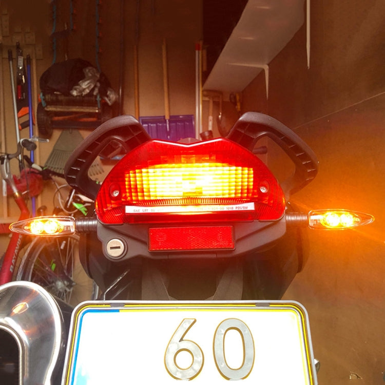 Illuminated red LED motorcycle rear turn signal light with rectangular light bar