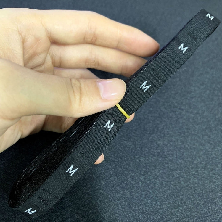 Polyester size label strip, black with repeated “M” print